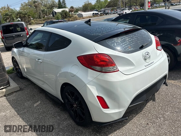 2012 Hyundai Veloster w/Gray Int с VIN KMHTC6AD6CU036826, выставлен на аукционе Copart как лот 48781135 с пробегом 169 498 миль миль и Чистый • Clean title. История ставок и продаж доступна на DreamBid. Изображение 3.