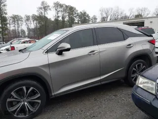 2021 Lexus RX with VIN 2T2HZMAA0MC191675, listed as a IAAI auction lot 41565196 with 67,490 mi miles. Bid and sale history available at carsss.com. Image 14.