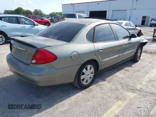 2003 Ford Taurus SEL Deluxe with VIN 1FAHP56S23G140685, listed as a IAAI auction lot 42109024 with 83,551 mi miles and . Bid and sale history available at DreamBid. Image 4.