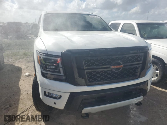 2021 Nissan Titan SV z VIN 1N6AA1FB2MN514566, wystawiony jako Copart lot #75194294 z przebiegiem 34 987 mil mil oraz Nie do naprawy • Non repairable. Historia ofert i sprzedaży dostępna na DreamBid. Obrazek 5.