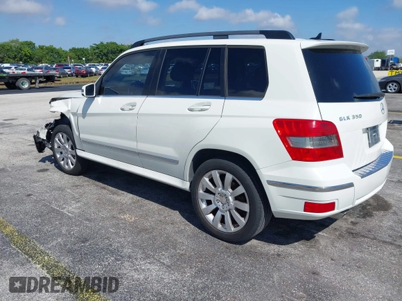 2012 Mercedes-Benz GLK GLK 350 with VIN WDCGG5GB8CF735979, listed as a IAAI auction lot 41931333 with 124,649 mi miles. Bid and sale history available at carsss.com. Image 3.