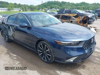 2023 Honda Accord Touring with VIN 1HGCY2F82PA029648, listed as a IAAI auction lot 42145629 with 22,289 mi miles and . Bid and sale history available at DreamBid. Image 1.
