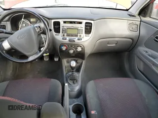 2009 Kia Rio LX with VIN KNADE243X96587429, listed as a Copart auction lot 46500825 with 116,557 mi miles and Salvage Title. Bid and sale history available at carsss.com. Image 8.