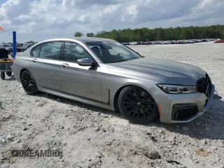 2022 BMW 7 Series 740i with VIN WBA7T2C09NCJ48292, listed as a Copart auction lot 51650315 with 21,585 mi miles and Salvage Title. Bid and sale history available at carsss.com. Image 4.