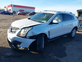 2012 Cadillac SRX Luxury Collection z VIN 3GYFNAE37CS576292, wystawiony jako IAAI lot #41048054 z przebiegiem 158 948 mil mil oraz . Historia ofert i sprzedaży dostępna na DreamBid. Obrazek 18.
