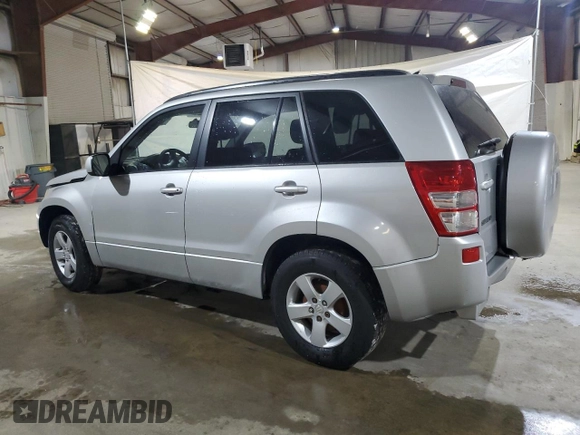 2006 Suzuki Grand Vitara Premium z VIN JS3TD943164103120, wystawiony jako Copart lot #56132585 z przebiegiem 143 313 mil mil oraz Szkoda całkowita • Salvage title. Historia ofert i sprzedaży dostępna na DreamBid. Obrazek 2.