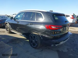 2023 BMW X5 sDrive40i with VIN 5UXCR4C00P9P46054, listed as a IAAI auction lot 41627025 with 20,152 mi miles. Bid and sale history available at carsss.com. Image 3.