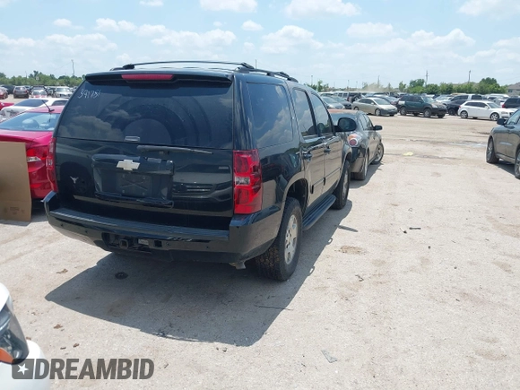 2011 Chevrolet Tahoe LT with VIN 1GNSCBE08BR391781, listed as a IAAI auction lot 42387512 with 169,257 mi miles and . Bid and sale history available at DreamBid. Image 4.