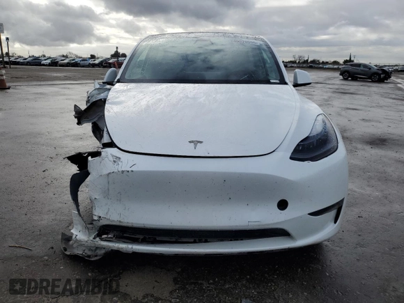 2023 Tesla Model Y Long Range z VIN 7SAYGAEE5PF743079, wystawiony jako Copart lot #45570655 z przebiegiem 46 145 mil mil oraz Szkoda całkowita • Salvage title. Historia ofert i sprzedaży dostępna na DreamBid. Obrazek 5.