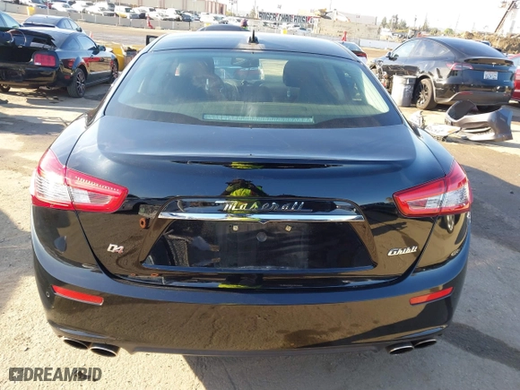 2014 Maserati Ghibli S Q4 with VIN ZAM57RTA2E1086046, listed as a IAAI auction lot 41846389 with 55,984 mi miles. Bid and sale history available at carsss.com. Image 16.