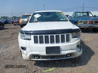 2015 Jeep Grand Cherokee Overland with VIN 1C4RJFCGXFC880096, listed as a IAAI auction lot 42706085 with 74,044 mi miles and . Bid and sale history available at DreamBid. Image 12.