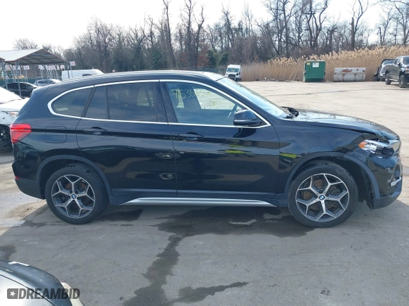 2019 BMW X1 xDrive28i with VIN WBXHT3C51K5L89758, listed as a IAAI auction lot 41535652 with 96,612 mi miles. Bid and sale history available at carsss.com. Image 13.