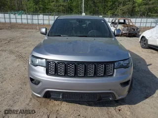2018 Jeep Grand Cherokee Laredo E with VIN 1C4RJFAG0JC284927, listed as a IAAI auction lot 41964013 with 130,145 mi miles. Bid and sale history available at carsss.com. Image 12.