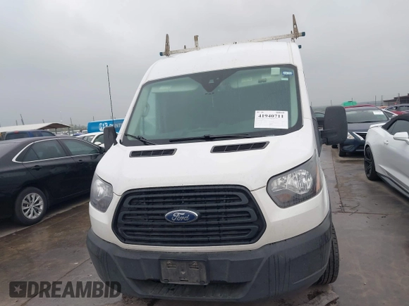 2019 Ford Transit with VIN 1FTYE1CM0KKB38525, listed as a IAAI auction lot 41940711 with 224,576 mi miles and . Bid and sale history available at DreamBid. Image 12.