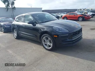 2023 Porsche Macan with VIN WP1AA2A58PLB16724, listed as a IAAI auction lot 41938233 with 19,660 mi miles. Bid and sale history available at carsss.com. Image 1.