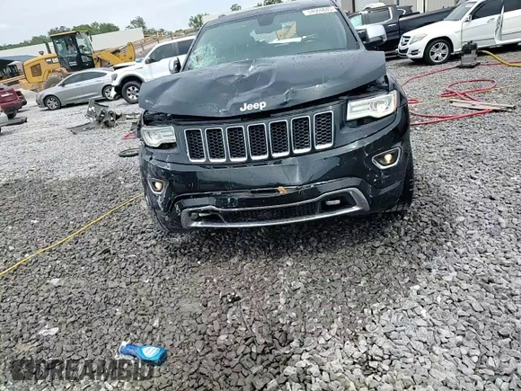 2015 Jeep Grand Cherokee Overland с VIN 1C4RJECG9FC620315, выставлен на аукционе Copart как лот 54569845 с пробегом 219 905 миль миль и Списание • Salvage title. История ставок и продаж доступна на DreamBid. Изображение 14.