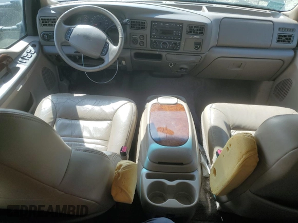 2001 Ford Excursion Limited z VIN 1FMSU43F71EA62211, wystawiony jako Copart lot #54668955 z przebiegiem 90 859 mil mil oraz Szkoda całkowita • Salvage title. Historia ofert i sprzedaży dostępna na DreamBid. Obrazek 8.