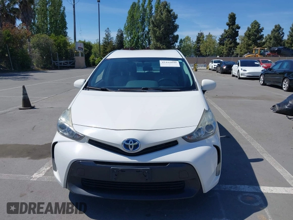 2016 Toyota Prius v Two with VIN JTDZN3EU5GJ051939, listed as a IAAI auction lot 42162040 with 275,213 mi miles. Bid and sale history available at carsss.com. Image 12.