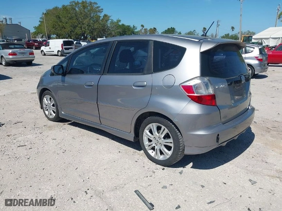 2009 Honda Fit Sport w/Navi with VIN JHMGE886X9S055014, listed as a IAAI auction lot 41847661 with 54,234 mi miles. Bid and sale history available at carsss.com. Image 3.