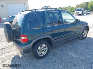 2002 Kia Sportage with VIN KNDJA723425144951, listed as a IAAI auction lot 42049262 with 149,793 mi miles. Bid and sale history available at carsss.com. Image 4.
