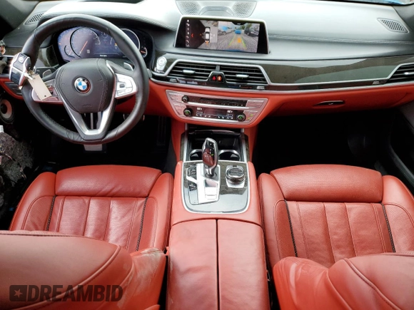 2019 BMW 7 Series 750i z VIN WBA7F0C51KGM25707, wystawiony jako Copart lot #61950495 z przebiegiem 56 768 mil mil oraz Nie do naprawy • Non repairable. Historia ofert i sprzedaży dostępna na DreamBid. Obrazek 8.