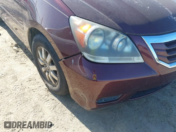 2009 Honda Odyssey EX-L with VIN 5FNRL38699B402476, listed as a IAAI auction lot 42146268 with 189,106 mi miles. Bid and sale history available at carsss.com. Image 6.