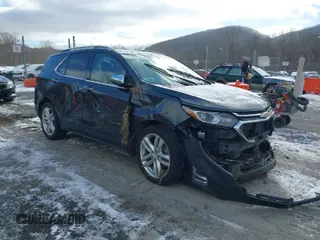 2018 Chevrolet Equinox Premier with VIN 3GNAXNEX0JS614356, listed as a IAAI auction lot 41624067 with 128,650 mi miles. Bid and sale history available at carsss.com. Image 1.
