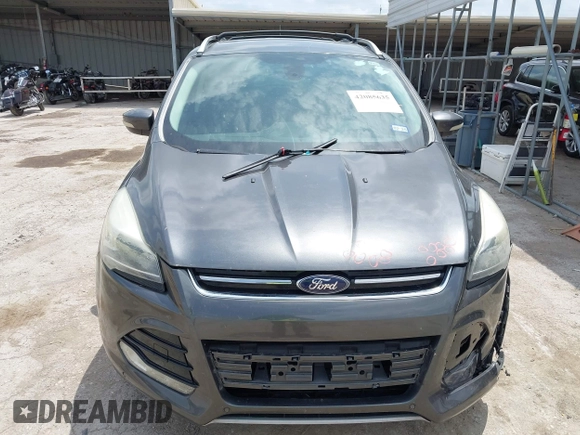 2015 Ford Escape Titanium z VIN 1FMCU0JX3FUA71770, wystawiony jako IAAI lot #42085635 z przebiegiem 141 890 mil mil oraz . Historia ofert i sprzedaży dostępna na DreamBid. Obrazek 12.
