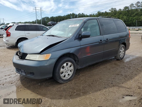 2003 Honda Odyssey EX-L with VIN 5FNRL18933B116127, listed as a Copart auction lot 56013645 with 157,118 mi miles and Salvage Title. Bid and sale history available at DreamBid. Image 1.