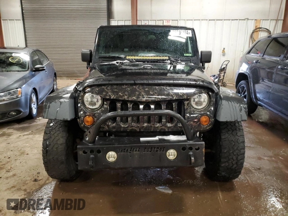 2010 Jeep Wrangler Rubicon with VIN 1J4BA6D10AL106213, listed as a Copart auction lot 86306184 with 180,825 mi miles and Clean title. Bid and sale history available at DreamBid. Image 5.