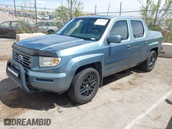 2006 Honda Ridgeline RTL with VIN 2HJYK16546H543552, listed as a IAAI auction lot 42187885 with 268,017 mi miles. Bid and sale history available at carsss.com. Image 2.