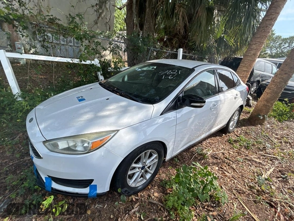 2015 Ford Focus SE with VIN 1FADP3F21FL338821, listed as a Copart auction lot 54631415 with 84,648 mi miles and Salvage Title. Bid and sale history available at carsss.com. Image 2.