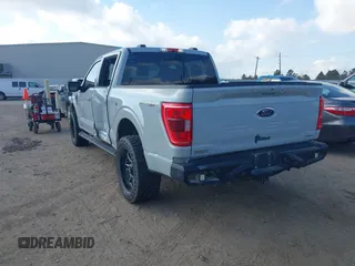 2023 Ford F-150 XL with VIN 1FTFW1E84PFA28761, listed as a IAAI auction lot 41532863 with 32,929 mi miles. Bid and sale history available at carsss.com. Image 3.