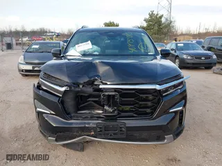 2024 Honda Pilot Touring with VIN 5FNYG1H72RB007519, listed as a IAAI auction lot 40973780 with 24,908 mi miles. Bid and sale history available at carsss.com. Image 12.