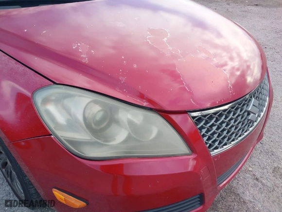 2012 Suzuki Kizashi SE with VIN JS2RE9A31C6101027, listed as a IAAI auction lot 41213426 with 174,490 mi miles. Bid and sale history available at carsss.com. Image 6.