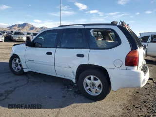 2003 GMC Envoy SLT with VIN 1GKDT13S232405530, listed as a Copart auction lot 45555865 with 138,680 mi miles and Salvage Title. Bid and sale history available at carsss.com. Image 2.