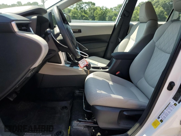 2023 Toyota Corolla Cross L with VIN 7MUAAAAG7PV044822, listed as a Copart auction lot 57744765 with 12,839 mi miles and Salvage title. Bid and sale history available at DreamBid. Image 7.