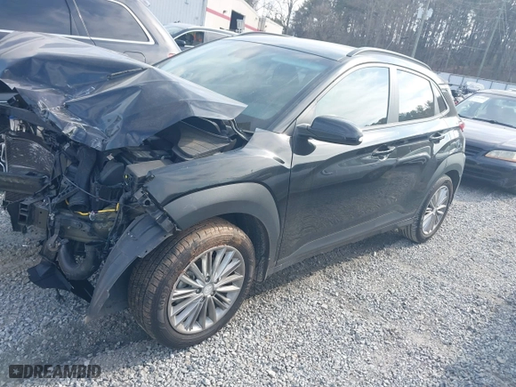2021 Hyundai Kona SEL with VIN KM8K22AA1MU605029, listed as a IAAI auction lot 41478328 with 57,429 mi miles. Bid and sale history available at carsss.com. Image 17.