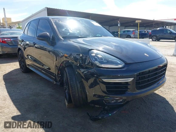 2015 Porsche Cayenne Turbo z VIN WP1AC2A2XFLA80727, wystawiony jako IAAI lot #42031257 z przebiegiem 83 368 mil mil oraz . Historia ofert i sprzedaży dostępna na DreamBid. Obrazek 1.