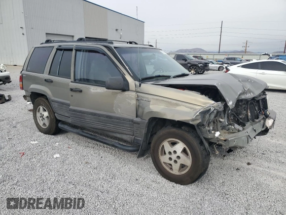 1995 Jeep Grand Cherokee Laredo with VIN 1J4GZ58S7SC743239, listed as a Copart auction lot 81717114 with 254,061 mi miles and Salvage Title. Bid and sale history available at carsss.com. Image 4.