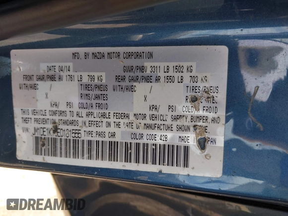 2014 Mazda 2 Sport with VIN JM1DE1KY0E0181555, listed as a IAAI auction lot 41539841 with 121,918 mi miles and . Bid and sale history available at DreamBid. Image 9.