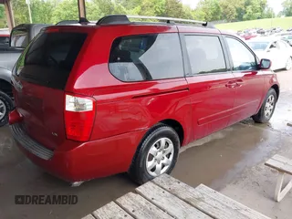 2009 Kia Sedona LX with VIN KNDMB233X96277536, listed as a IAAI auction lot 42108653 with 260,258 mi miles and . Bid and sale history available at carsss.com. Image 4.
