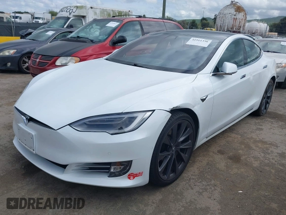 2018 Tesla Model S 75D with VIN 5YJSA1E23JF271465, listed as a IAAI auction lot 41911356 with 50,483 mi miles and . Bid and sale history available at DreamBid. Image 2.