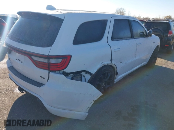 2021 Dodge Durango R/T with VIN 1C4SDJCT4MC663939, listed as a IAAI auction lot 40950558 with 52,054 mi miles and . Bid and sale history available at DreamBid. Image 4.