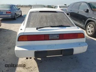 1988 Nissan 300ZX GS z VIN JN1HZ16S6JX204756, wystawiony jako Copart lot #75877174 z przebiegiem Nie podano mil oraz Szkody całkowita. Historia ofert i sprzedaży dostępna na DreamBid. Obrazek 6.
