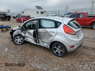 2011 Ford Fiesta SES with VIN 3FADP4FJ7BM186601, listed as a Copart auction lot 51461585 with 140,044 mi miles and Salvage Title. Bid and sale history available at carsss.com. Image 2.
