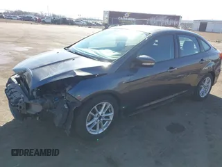 2016 Ford Focus SE with VIN 1FADP3F21GL212718, listed as a IAAI auction lot 41785985 with 101,198 mi miles. Bid and sale history available at carsss.com. Image 2.