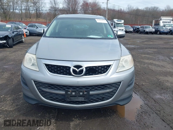 2012 Mazda CX-9 Touring with VIN JM3TB3CV8C0337396, listed as a IAAI auction lot 41961658 with 131,698 mi miles and . Bid and sale history available at DreamBid. Image 12.