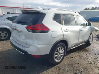 2018 Nissan Rogue SV with VIN KNMAT2MV7JP574729, listed as a IAAI auction lot 41812425 with 106,159 mi miles. Bid and sale history available at carsss.com. Image 4.