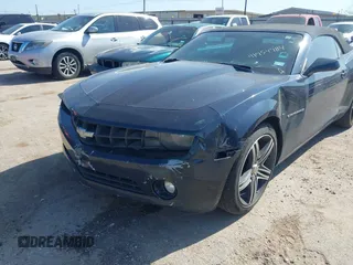 2013 Chevrolet Camaro LT z VIN 2G1FC3D33D9134173, wystawiony jako IAAI lot #41954984 z przebiegiem 157 919 mil mil oraz . Historia ofert i sprzedaży dostępna na DreamBid. Obrazek 6.